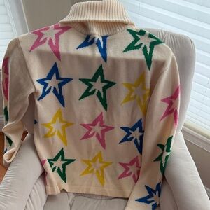 Perfect Moment Cream Turtleneck with Colorful Stars size small